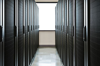Storage racks aligned in a computer server room